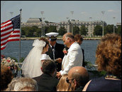 Wedding on top deck with Naval Acadamey background